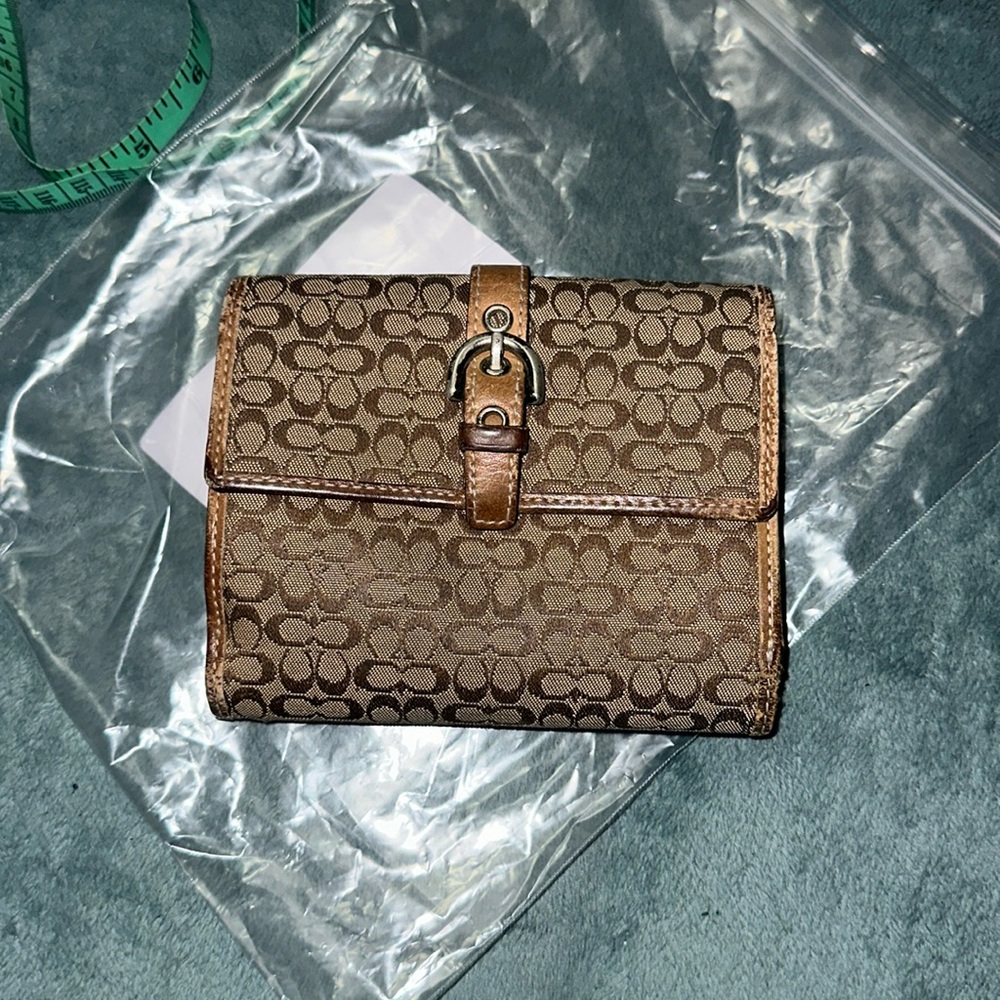 Coach mini signature brown and tan wallet with silver hardware buckle detail